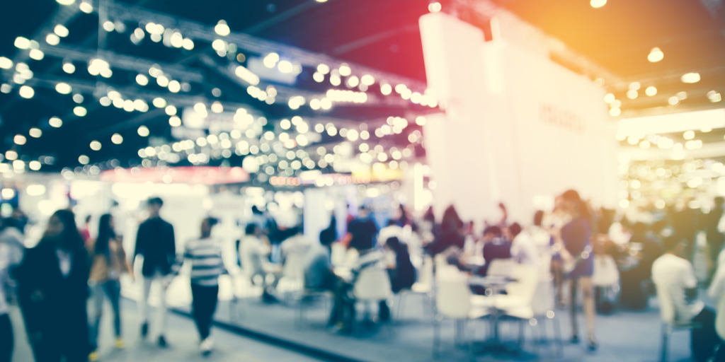 People at exhibition blurred